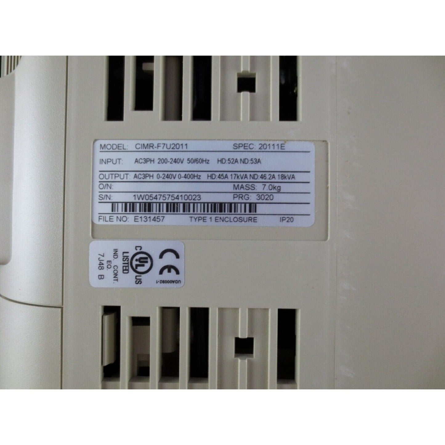YASKAWA F7 CIMR-F7U2011 AC Drive, beige casing with label details. Industrial automation equipment.