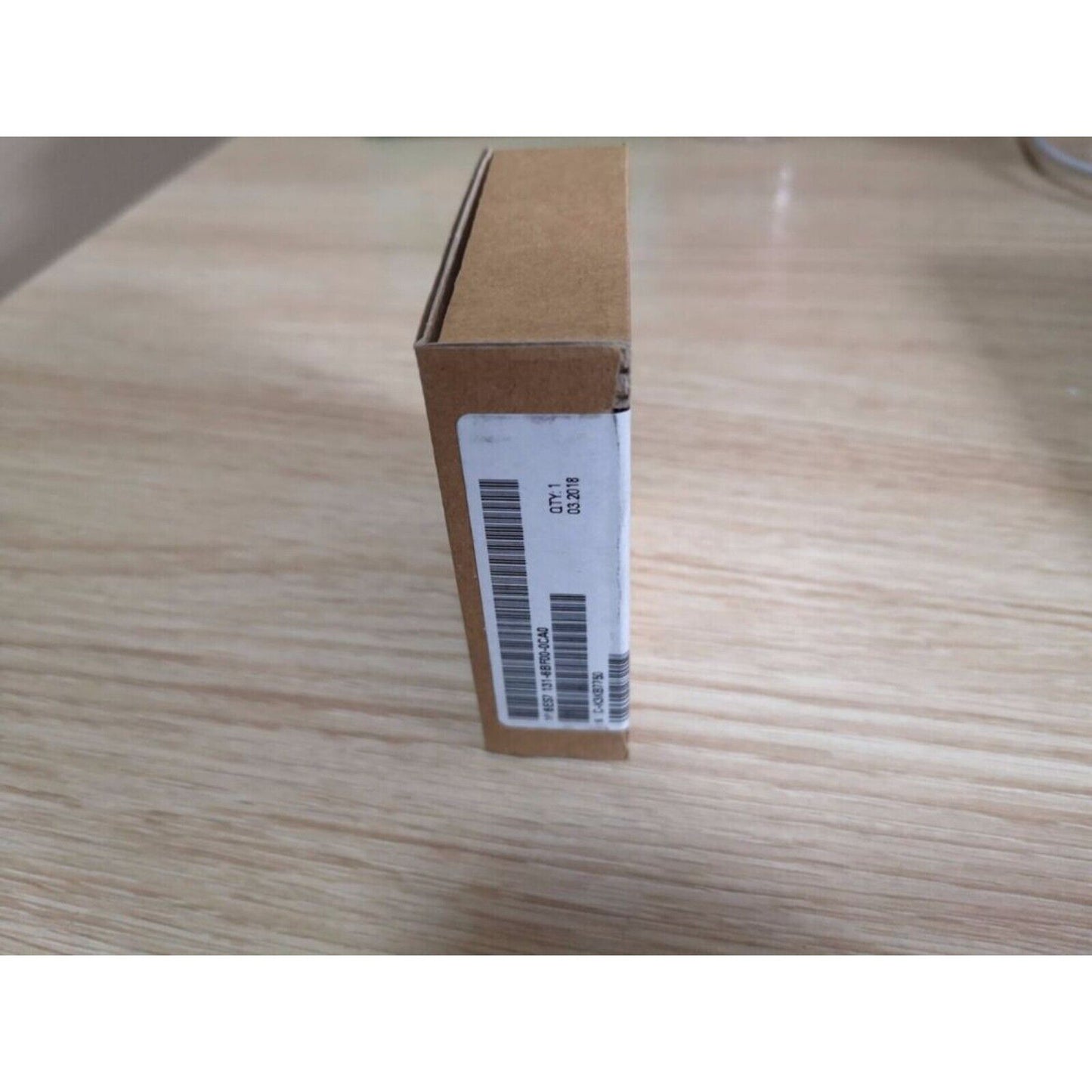 Siemens 6ES7 131-6BF00-0CA0 ET 200SP digital input module box, product label visible, automation part.