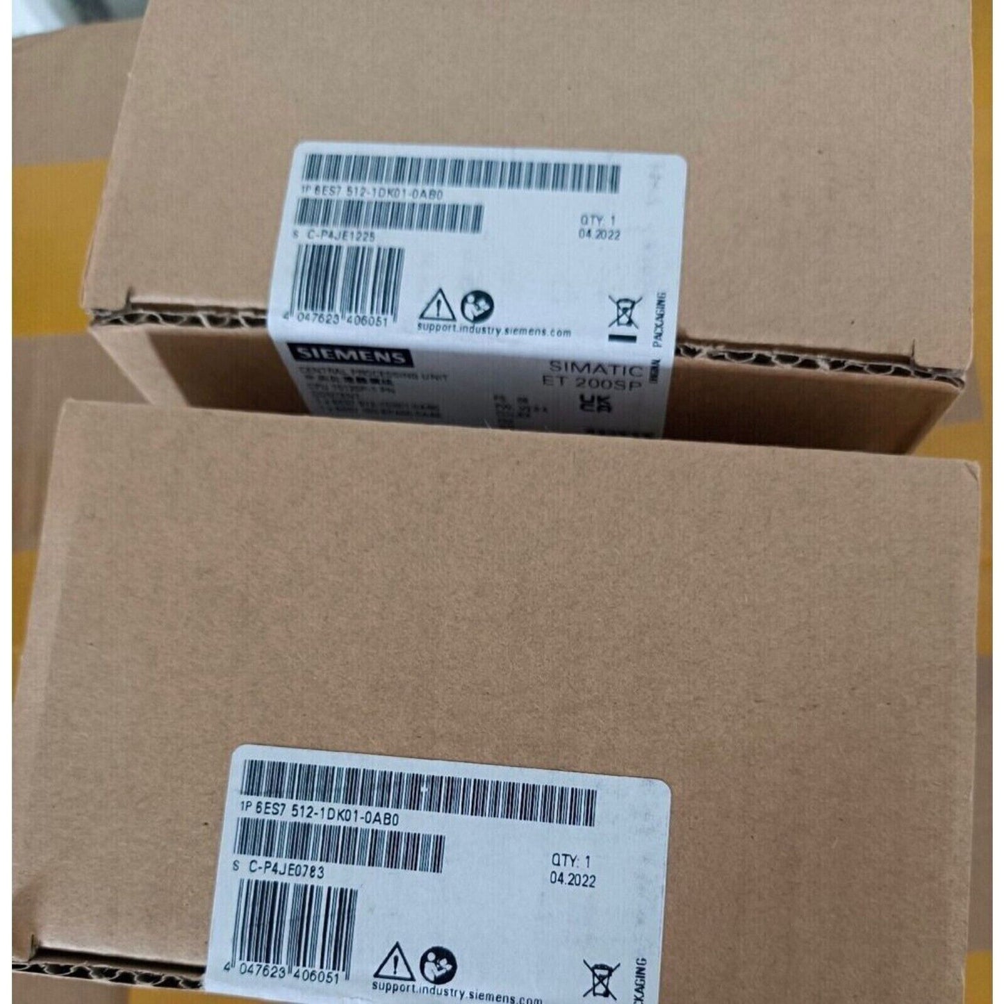 Siemens SIMATIC ET 200SP PLC CPU box, model 6ES7 512-1DK01-0AB0, industrial automation part packaging.