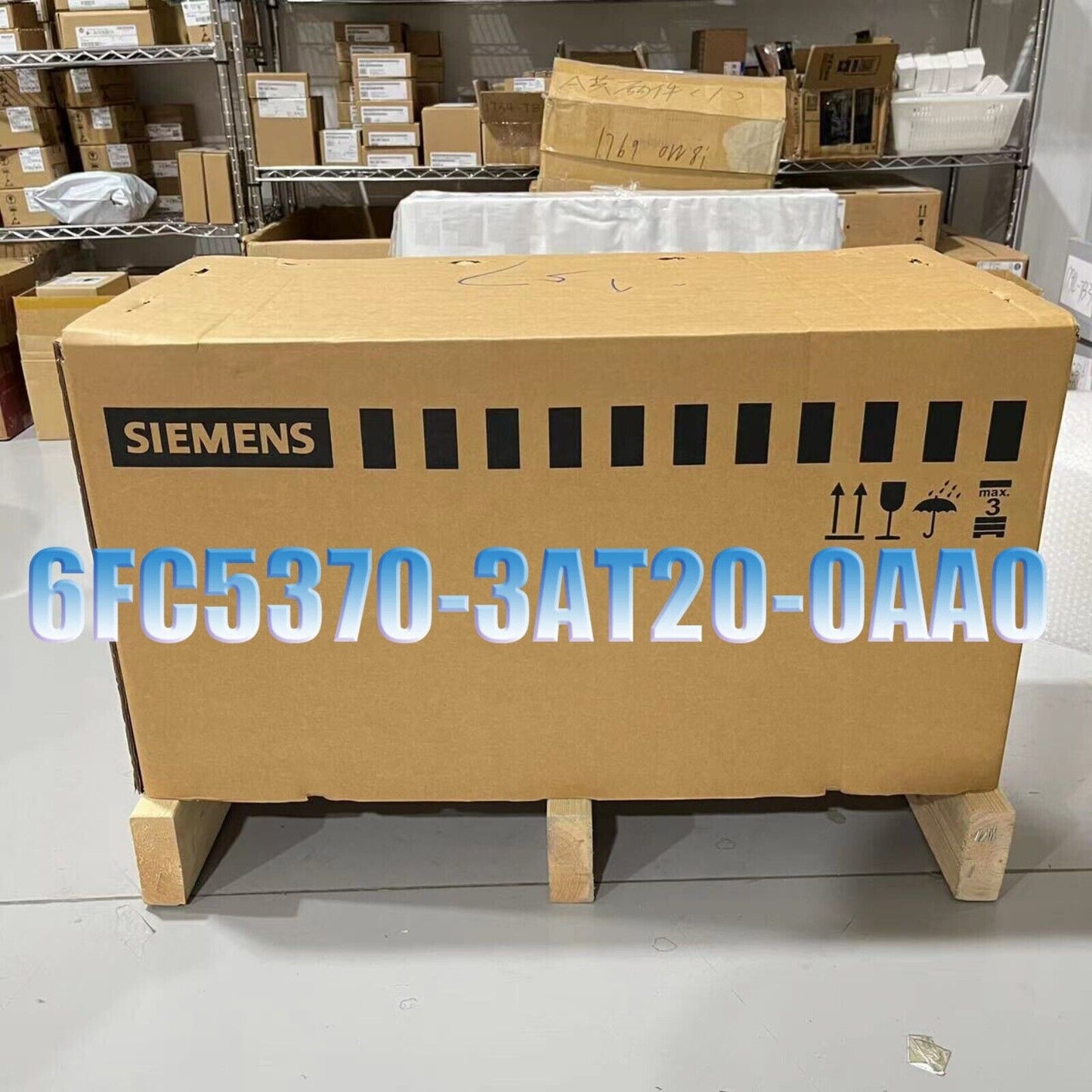 Siemens 6FC5370-3AT20-0AA0 PLC product packaging on wooden pallet, industrial automation parts.