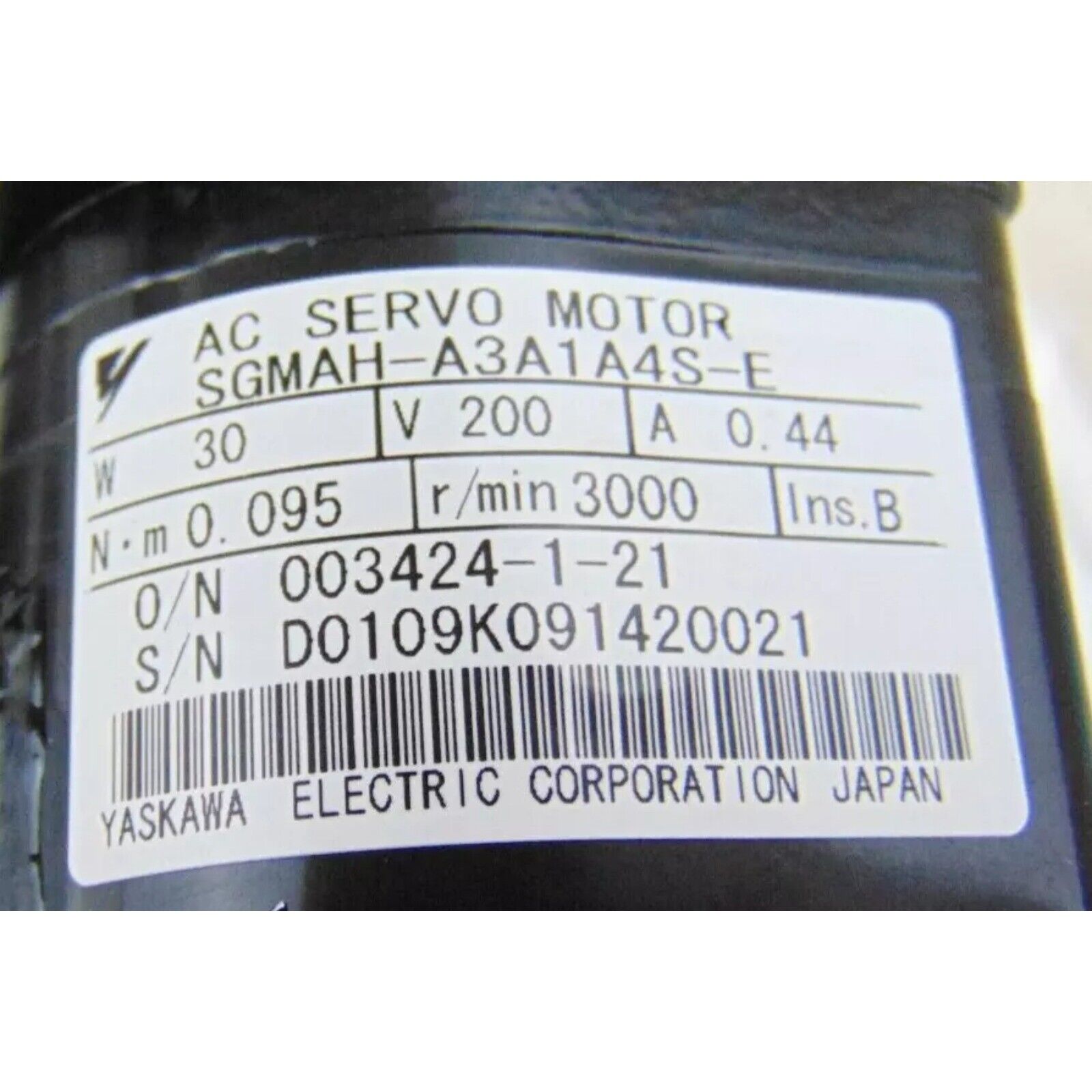 Yaskawa SGMAH-A3A1A4S-E AC servo motor label, industrial automation part, 30W, 200V, 0.44A, made in Japan.