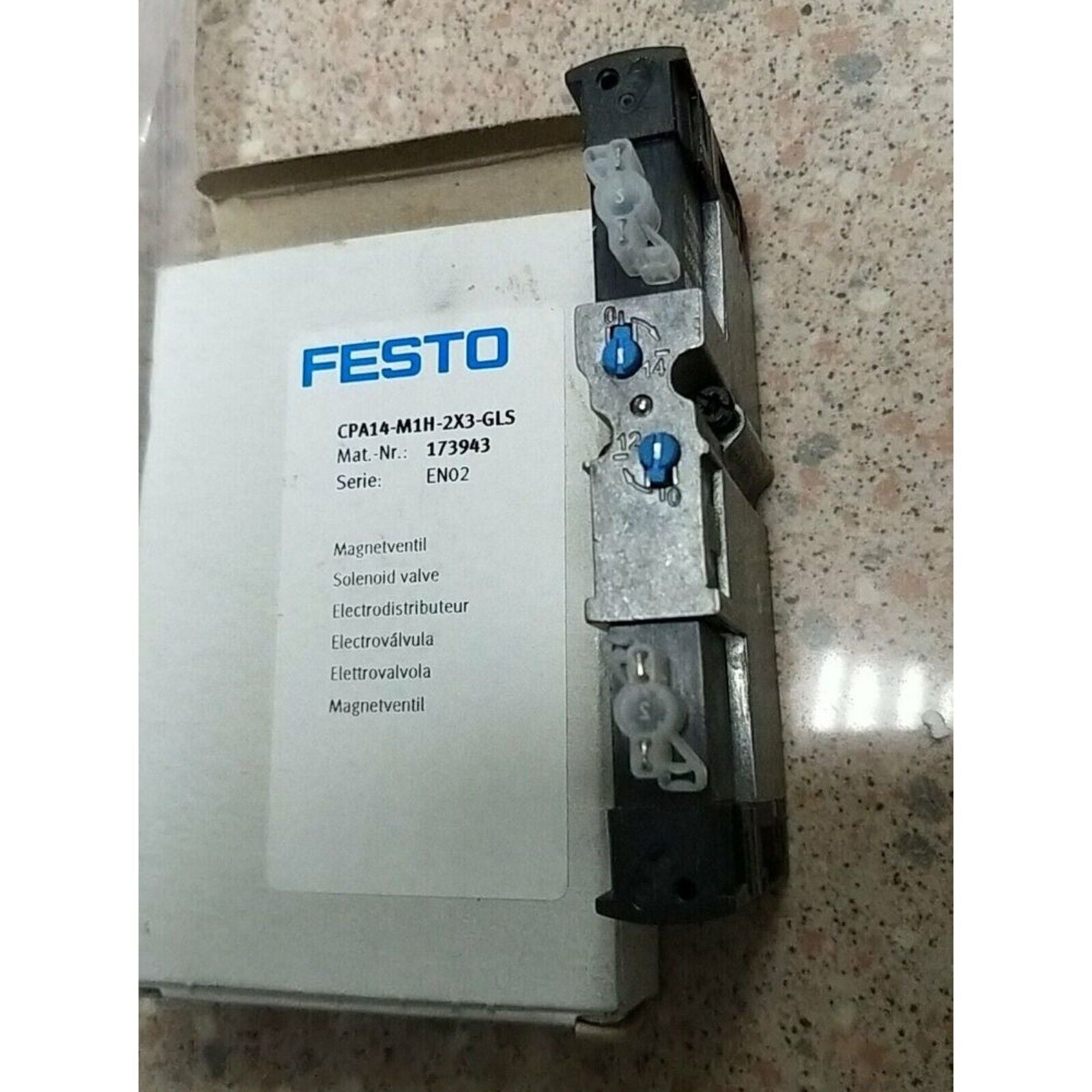 FESTO CPA14-M1H-2X3-GLS solenoid valve, industrial automation component with blue accents.