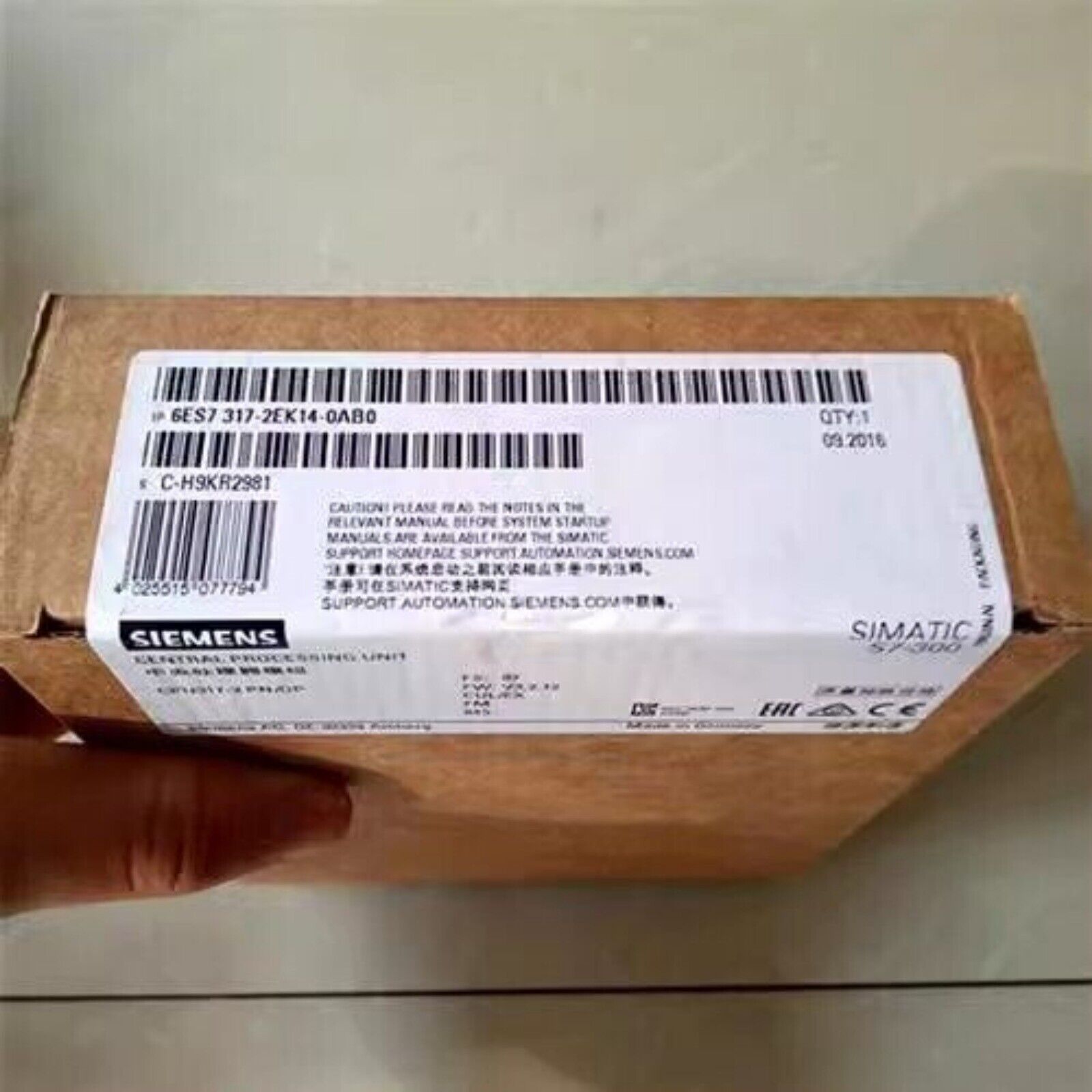 Siemens SIMATIC S7-300 CPU 317-2EK14-0AB0 PLC Module packaging box with product details, industrial automation component.