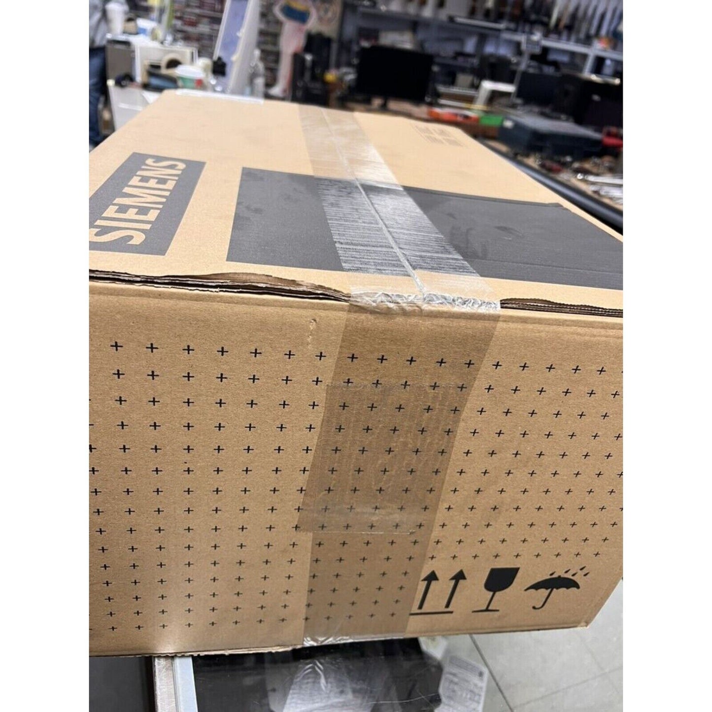 Siemens SINAMICS S120 module box, brown cardboard packaging, SIEMENS brand, industrial automation part.