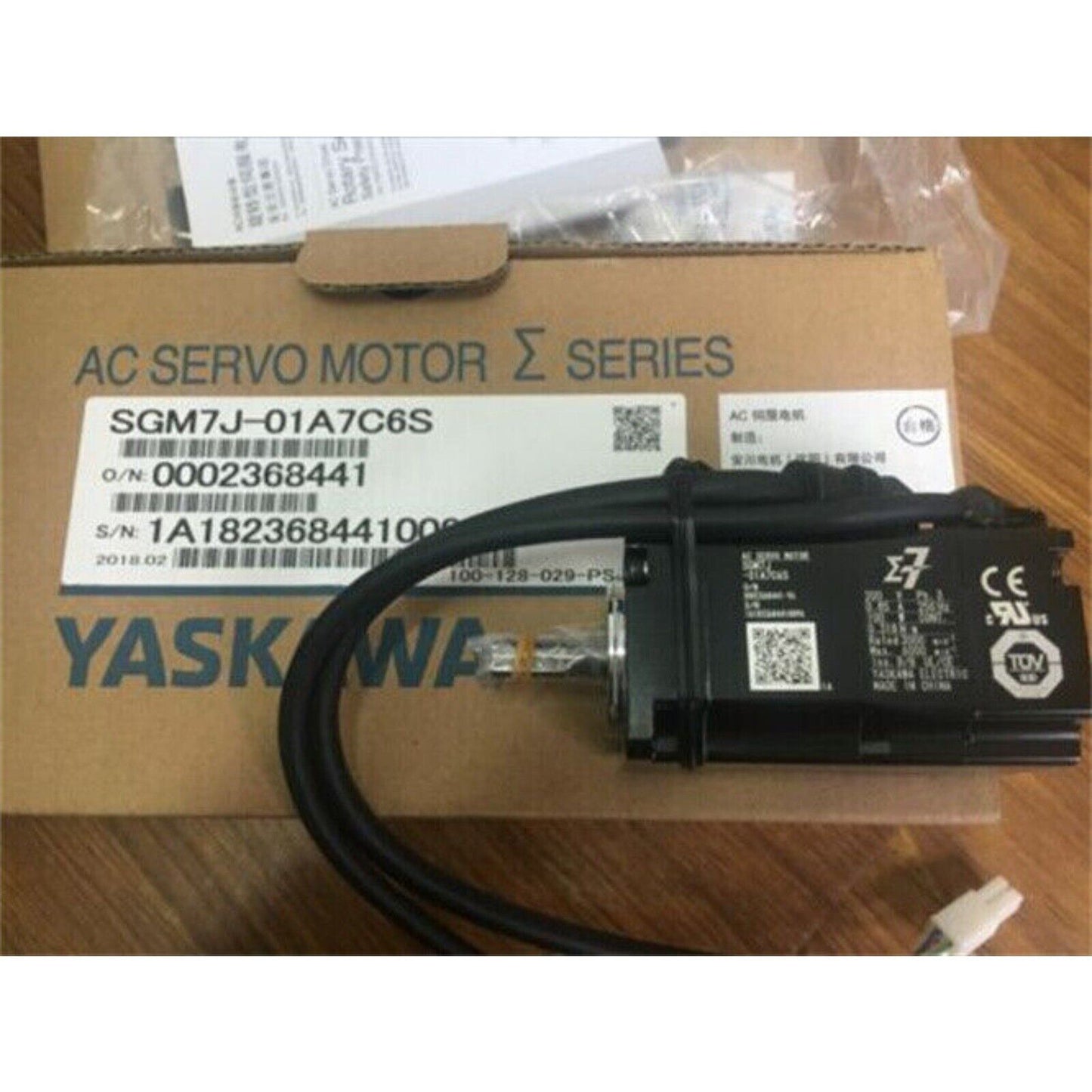 YASKAWA SGM7J-01A7C6S Servo Motor in box, featuring AC Servo Motor information and specifications.