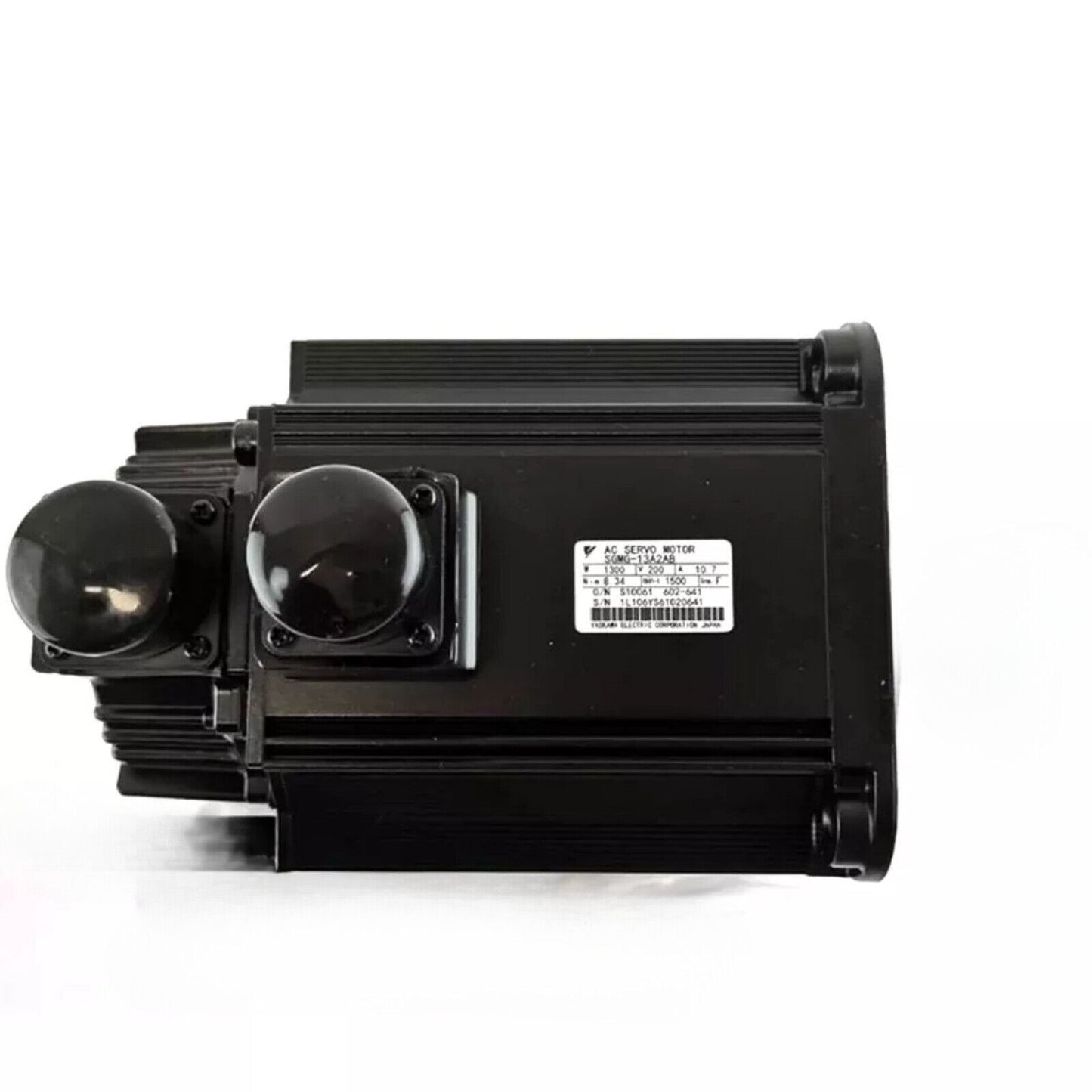 YASKAWA SGMG-13A2AB AC Servo Motor. Black servo motor with product details label.
