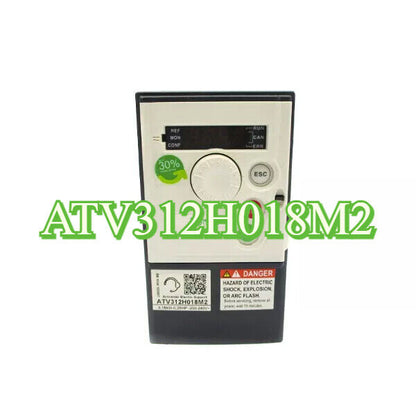 Schneider ATV312H018M2 VFD, featuring a control panel with display and control knobs.