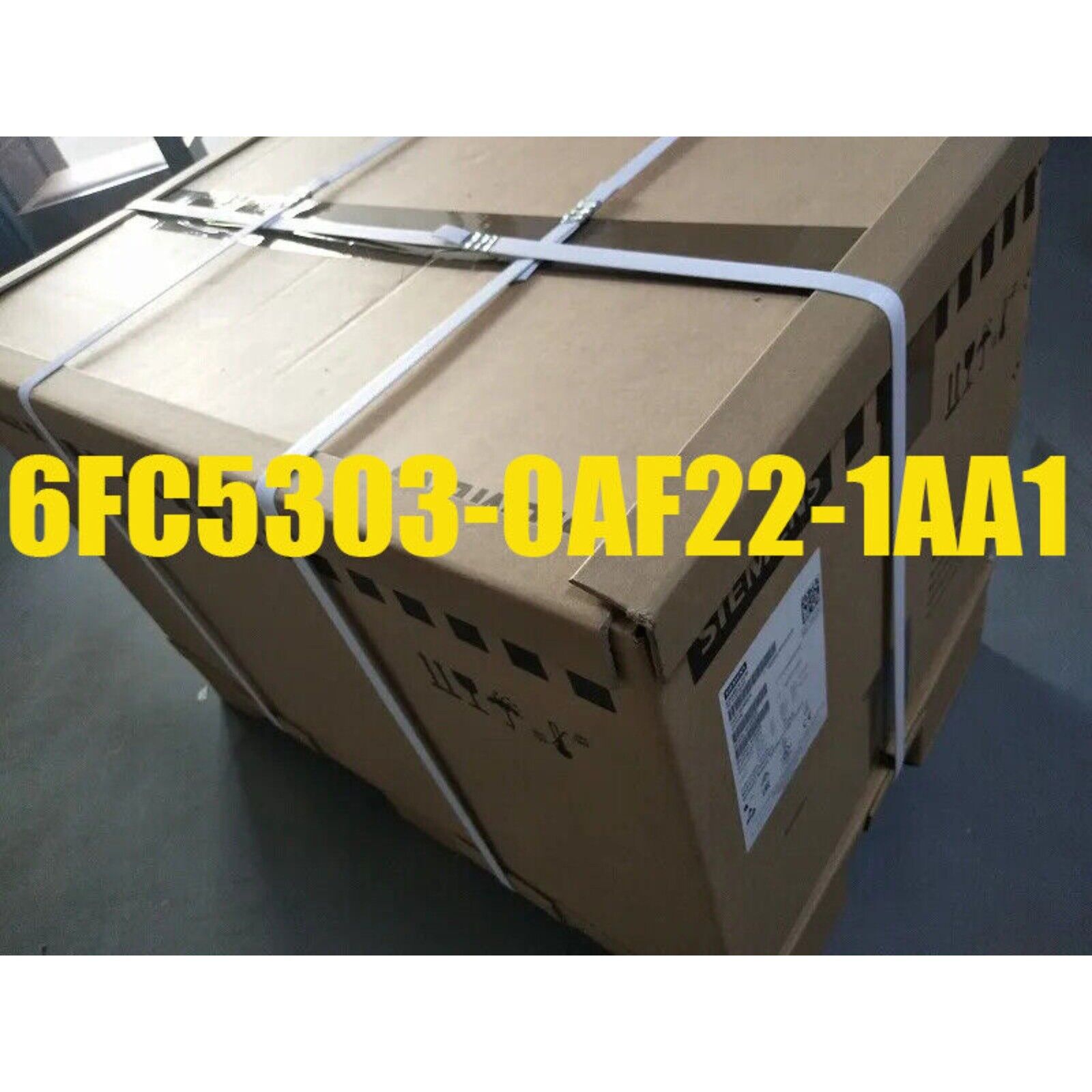 Siemens 6FC5303-0AF22-1AA1 PLC product box, sealed with white straps, industrial automation part ready for shipping.