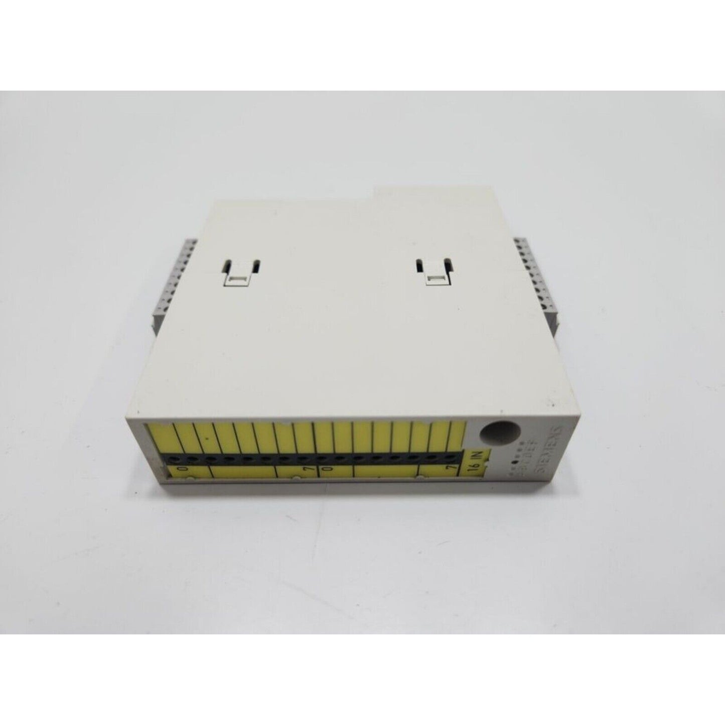 Siemens 6FC5111-0CA01-0AA0 electronic module. Beige casing with yellow indicator lights, 16 IN marking. CNC DMP component.