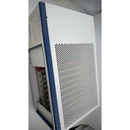 National Instruments PXIe-1078 TCXO PXI Chassis, white and blue industrial automation equipment. NI PXI Express Mainframe.
