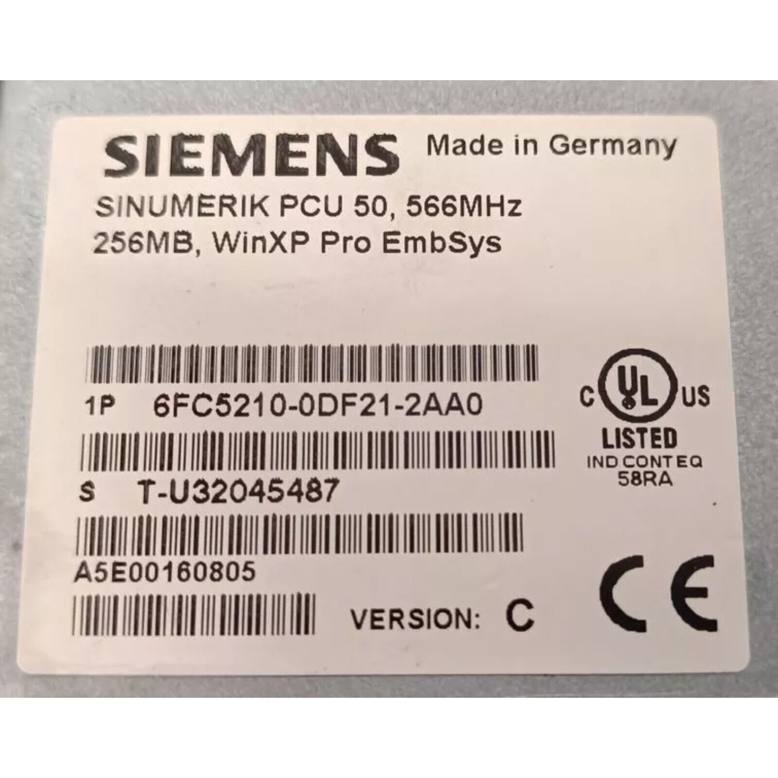 Siemens SINUMERIK PCU 50 industrial automation part label, 6FC5210-0DF21-2AA0, Made in Germany.