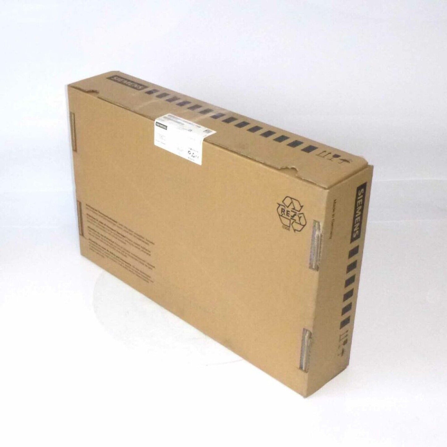 Siemens SINAMICS S120 control unit packaging, brown cardboard box with product label.