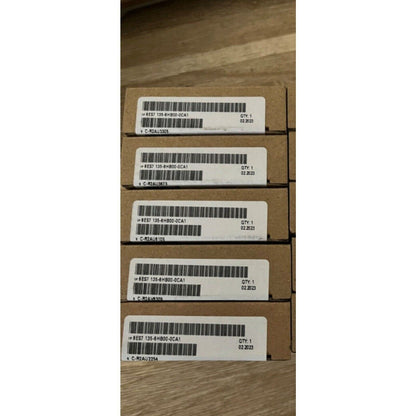 Siemens ET 200SP Analog Output Modules in packaging, product labels visible, QTY: 1, industrial automation parts