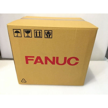 FANUC PLC A20B-3300-0313 board in a brown cardboard box with handling symbols, industrial automation part