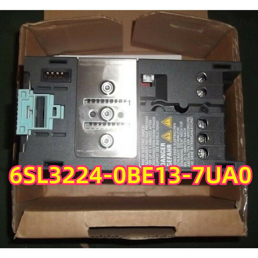 Siemens SINAMICS G120P 6SL3224-0BE13-7UA0 power module with braking and PROFINET. Warning labels visible.