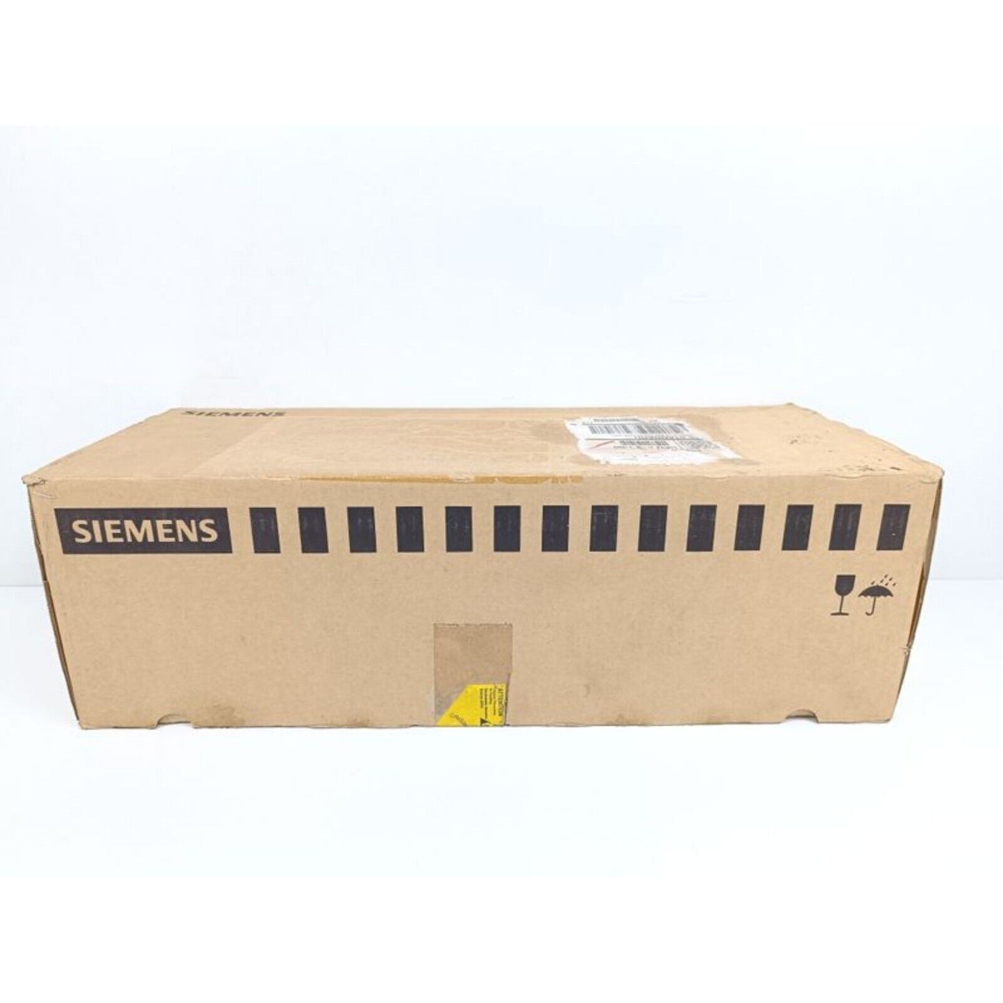 Siemens PLC product packaging, brown cardboard box, Siemens logo, industrial automation parts.