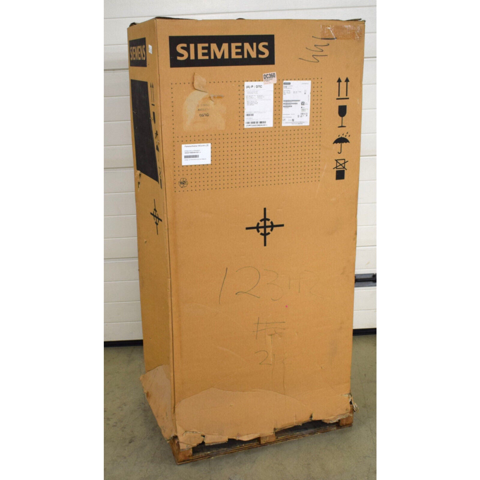 Siemens S120 Active Line Module shipping box. Brown cardboard box with Siemens logo and shipping labels, on a pallet.