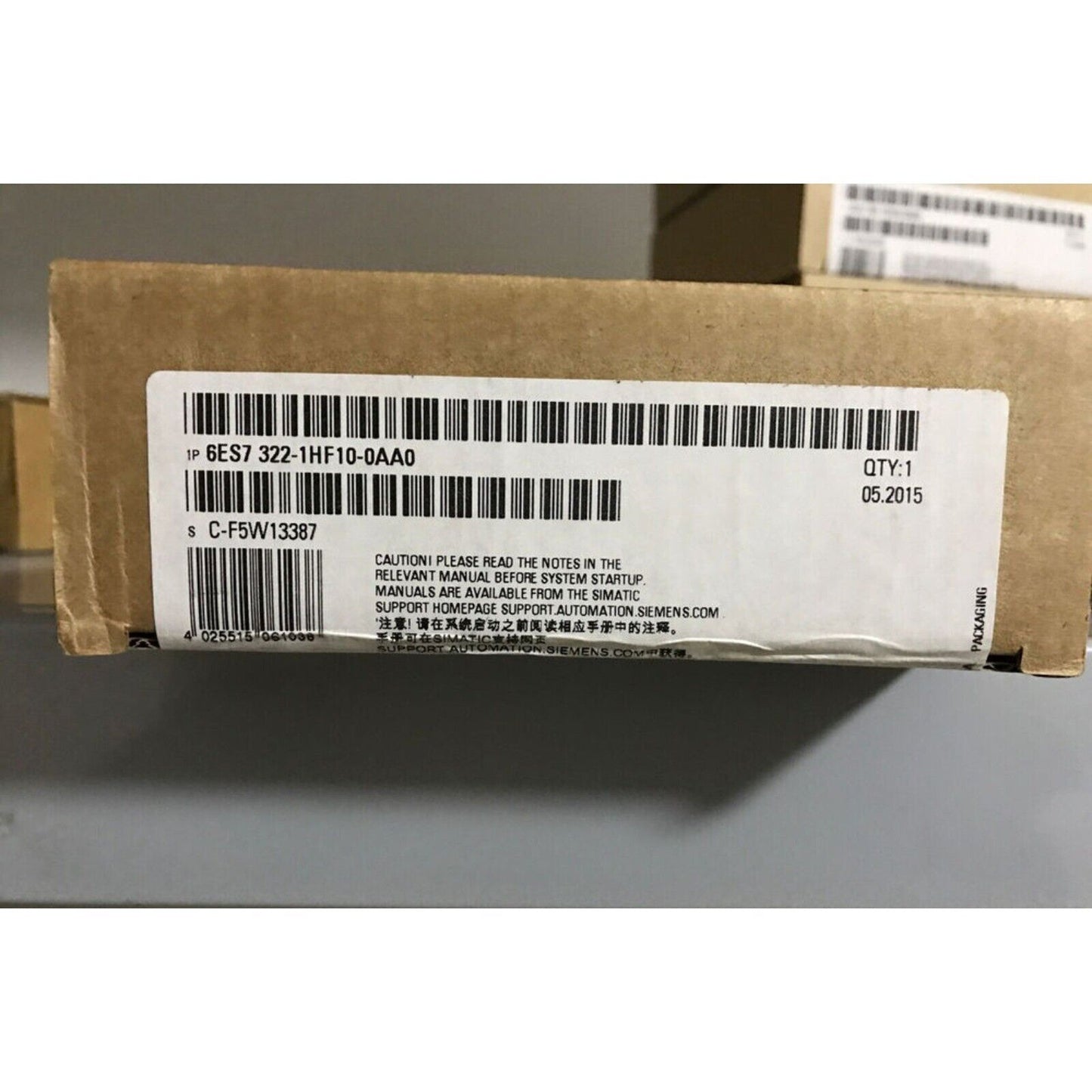 Siemens SIMATIC S7-300 Digital Output Module in box with product information, industrial automation part 6ES7 322-1HF10-0AA0