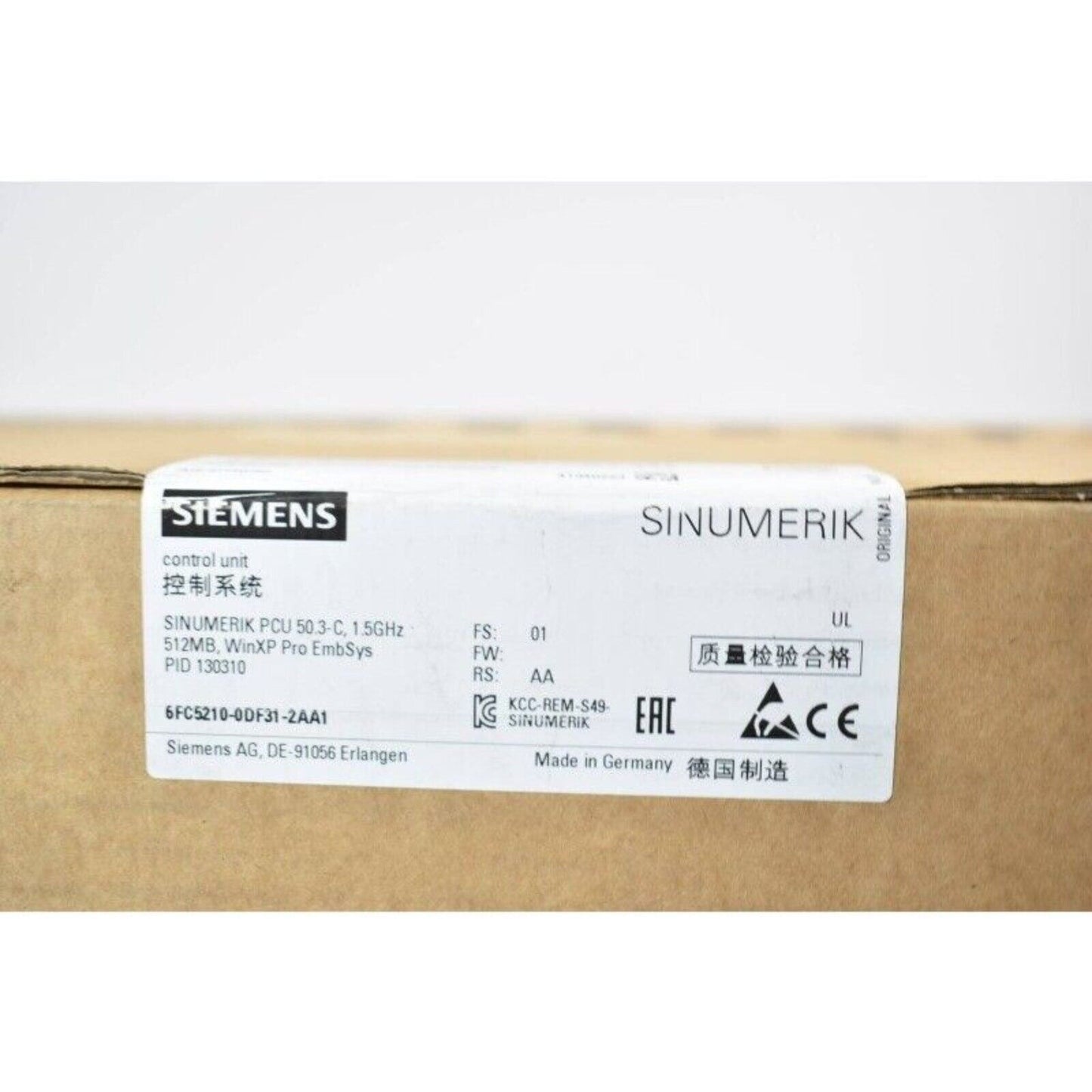 Siemens SINUMERIK PCU 50.3-C industrial control unit label, Made in Germany, 6FC5210-0DF31-2AA1, product quality check.