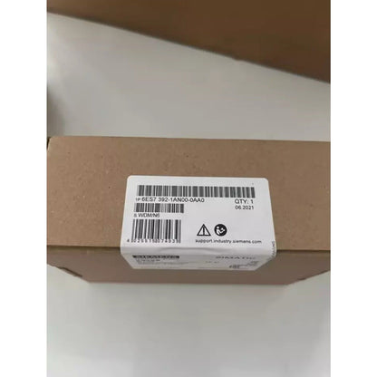 Siemens S7-300 PLC module 6ES7392-1AN00-0AA0 in a cardboard box, with product label and SIMATIC brand.
