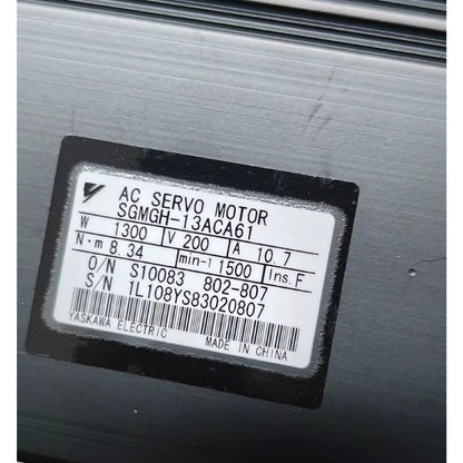 Yaskawa SGMGH-13ACA61 servo motor label. Made in China. Specs: 1300W, 200V, 10.7A. Industrial automation spare.