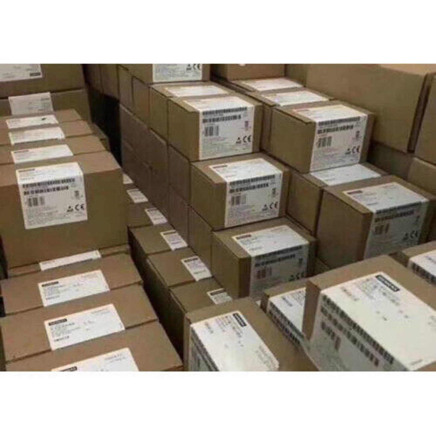 Siemens SINAMICS G120 Control Unit CU250S-2 boxes in warehouse, industrial automation components.