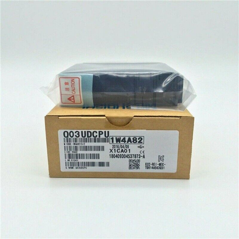 Mitsubishi Q03UDCPU PLC Module, new, in box, with product information labels.