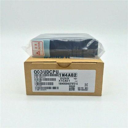 Mitsubishi Q03UDCPU PLC Module, new, in box, with product information labels.