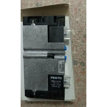 Festo MSZC-3-21 DC solenoid valve component. Industrial automation equipment with blue accents and product details.