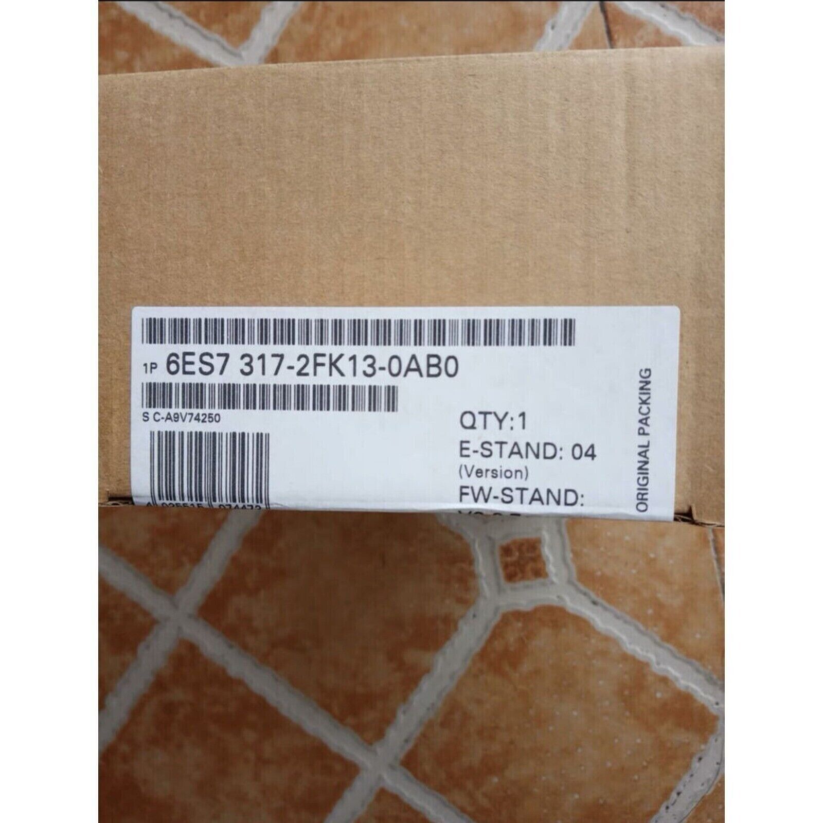 Siemens SIMATIC S7-300 PLC in original packaging, model 6ES7 317-2FK13-0AB0, industrial automation part.