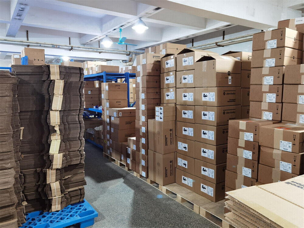 Allen-Bradley 1756-IRT8I PLC modules stacked in boxes, ready to ship, new in box. Fast shipping.