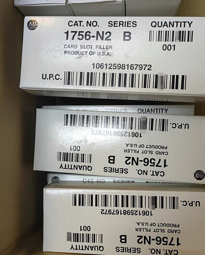 Allen-Bradley 1756-N2 slot filler boxes, white cardboard, product of USA, for ControlLogix chassis.