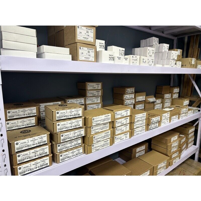 Allen-Bradley PLC modules in boxes on shelves, ready for shipping, industrial automation parts