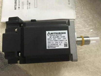 Mitsubishi HF-KE43W1-S100 AC Servo Motor, Black Industrial Motor, with specifications label.