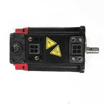 FANUC A06B-0115-B855#0059 Servo Motor, black and red with warning symbols, industrial automation part