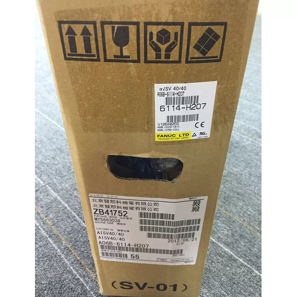 FANUC A06B-6114-H207 Servo Driver Box. Industrial Automation Component, Part Number 6114-H207, Shipping Box with Labels.