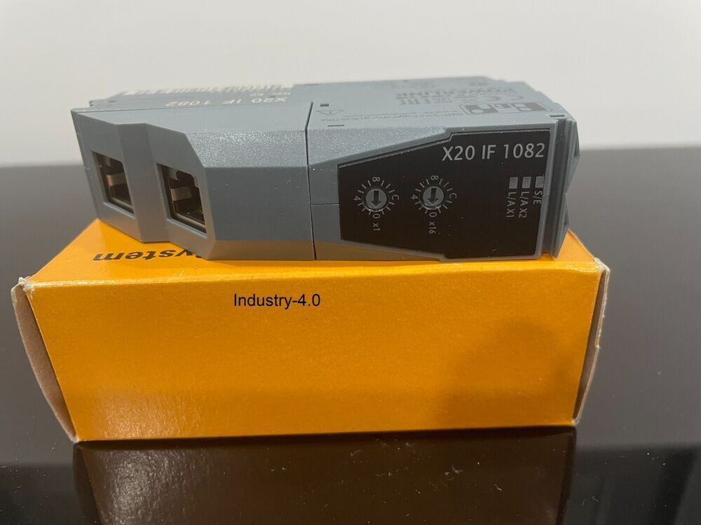 B&R X20 IF 1082 interface module, gray and black, on yellow box, Industry-4.0 automation.