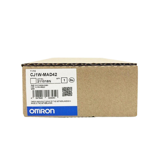 Omron CJ1W-MAD42 Analog I/O Unit box. US STOCK, manufactured in the Netherlands. Product details and barcode are visible.
