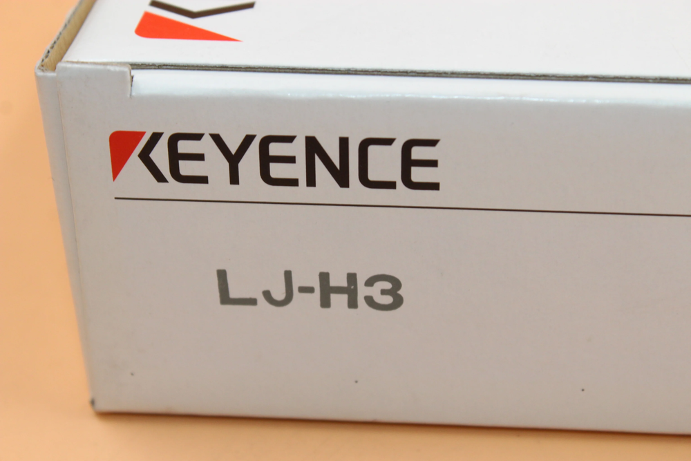 KEYENCE LJ-H3 sensor product box, white with logo.