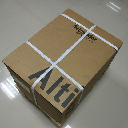 Schneider Electric ATV61HD55N4Z Inverter in a shipping box, new industrial automation part