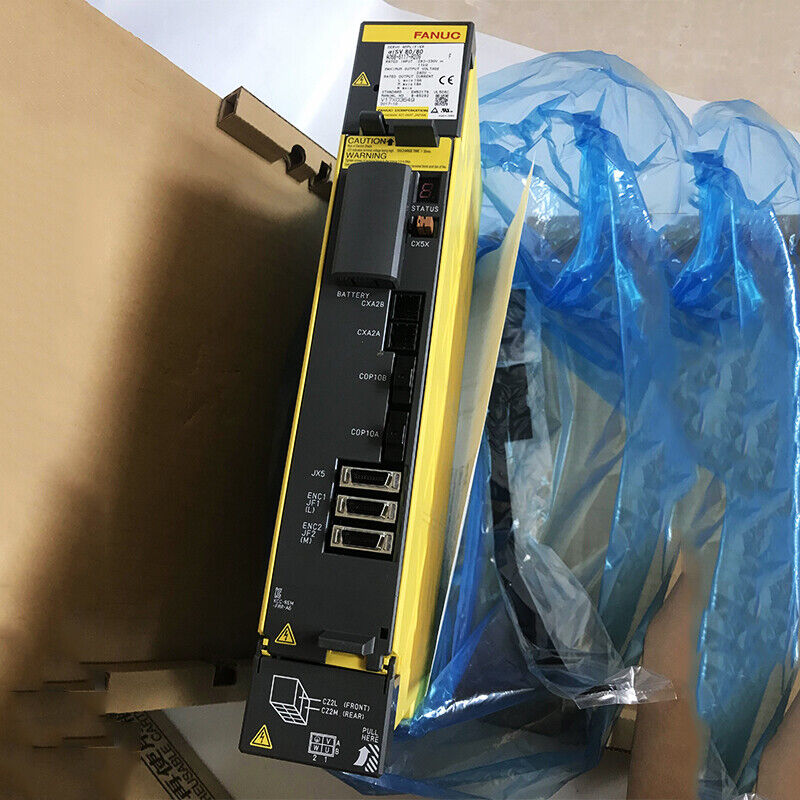FANUC A06B-6240-H209 Servo Drive, new in box, yellow and black electrical component, with multiple ports and labels.