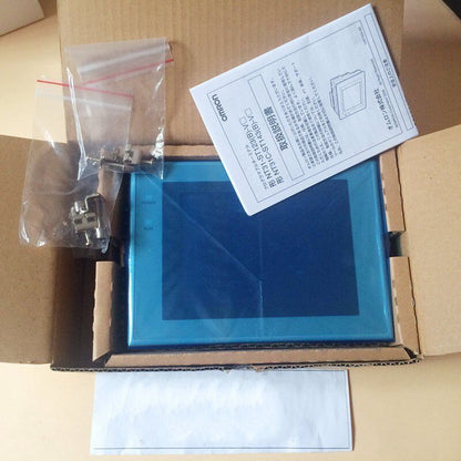 Omron NT31C-ST143-V3 touch screen HMI in box with accessories and documentation. Expedited shipping.