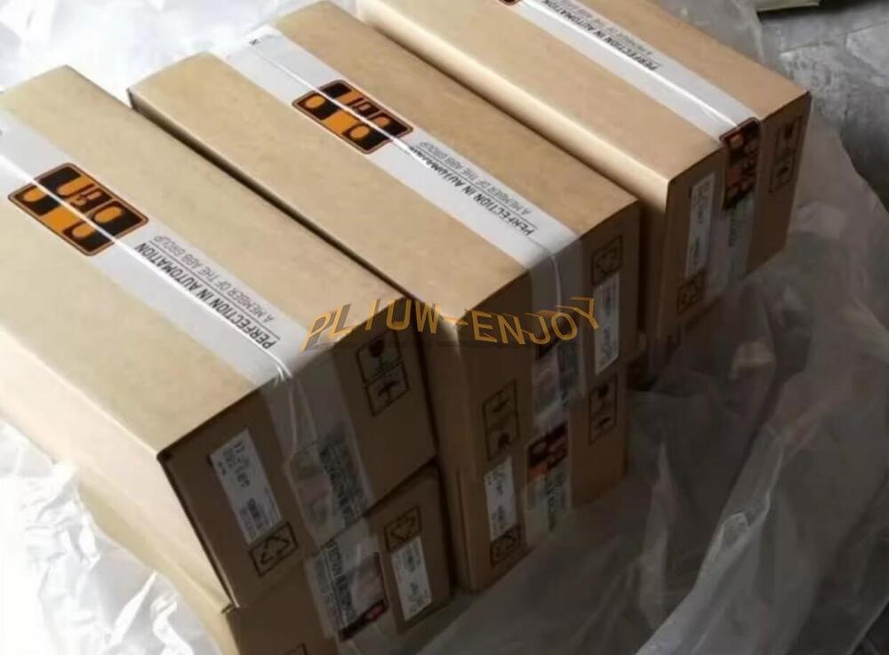 Boxes of B&R servo motors, labeled with technical specifications, for industrial automation, ABB Group member.