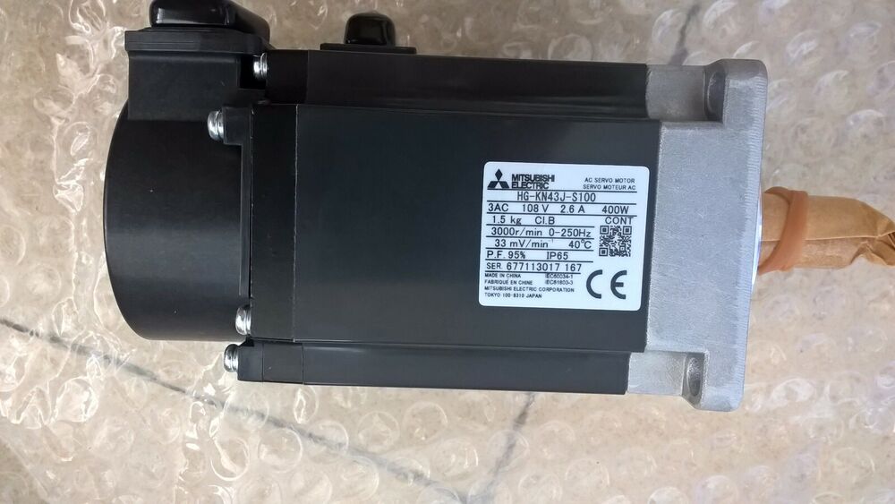 Mitsubishi HG-KN43J-S100 servo motor, 400W, black and silver industrial automation part