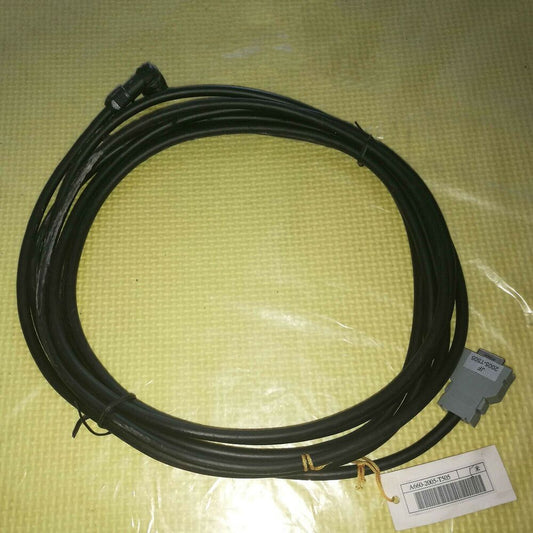 FANUC A660-2005-T505 5m Servo Motor Encoding Cable, black, coiled on yellow surface, with connector and product label.