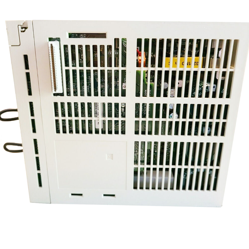 YASKAWA SGDH-10AE Servo Drive, rear view, with cooling vents and circuit boards visible.