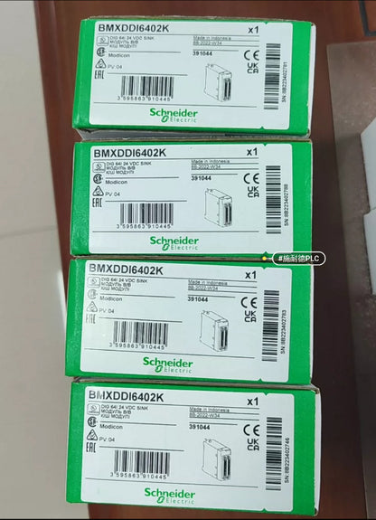 Schneider BMXDDI6402K module boxes, new in box, multiple units, front view, PLC components