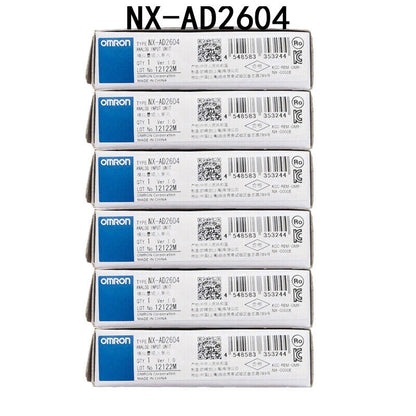 OMRON NX-AD2604 analog input module boxes, stacked, new in box.