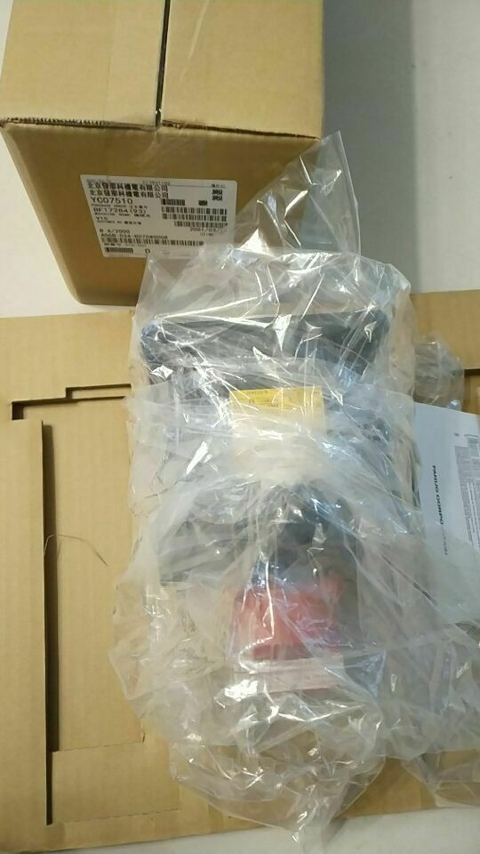New FANUC A06B-0034-B075#7000 servo motor in box, factory packaging, industrial automation part.