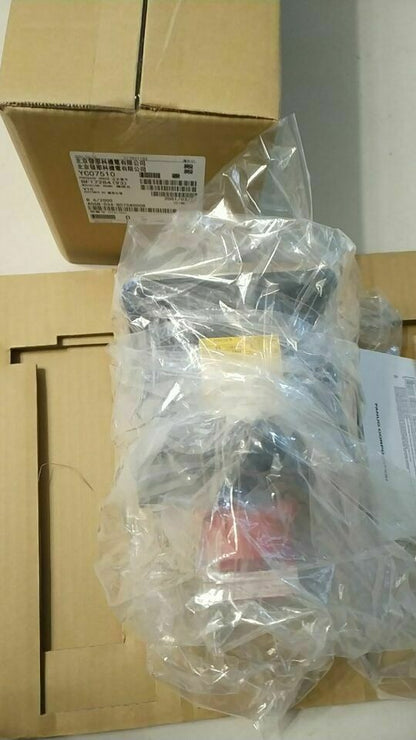 New FANUC A06B-0034-B075#7000 servo motor in box, factory packaging, industrial automation part.